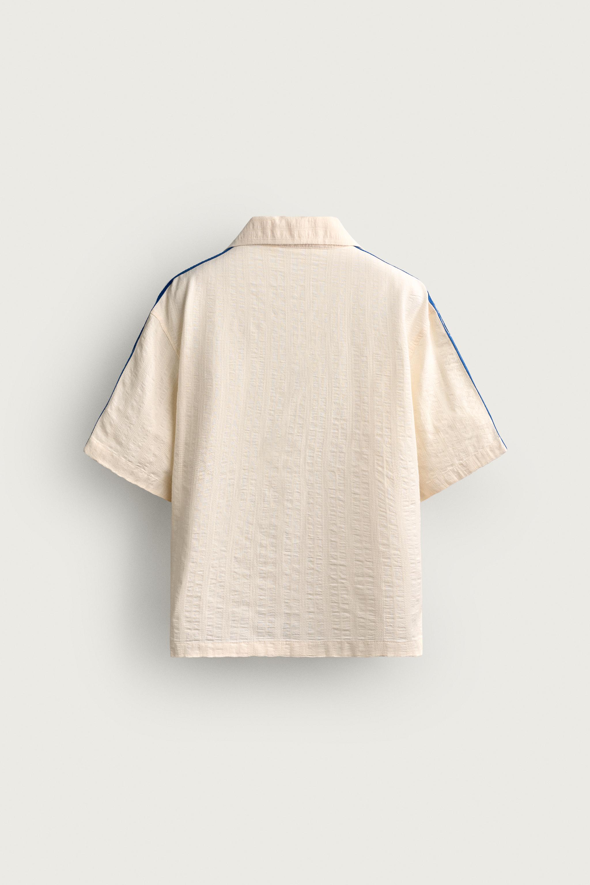 CHEMISE À BANDES AVEC BRODERIE EN CONTRASTE